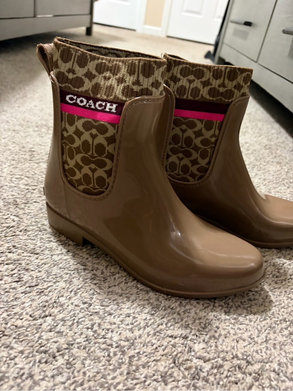 COACH Tan Patent Rain Booties with Signature Monogram Knit Shaft and Pink Stripe